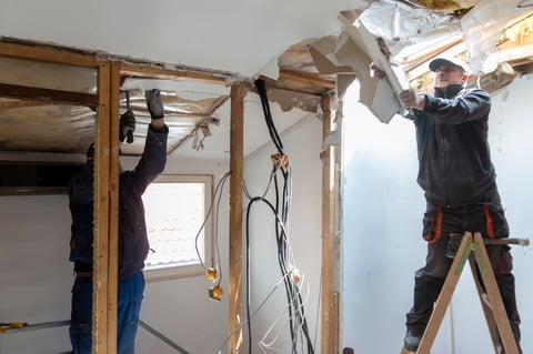 Restoration crew working together on a multifamily apartment community building.