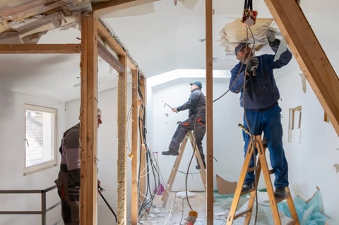 Restoration and renovation crew on the job during apartment restoration.